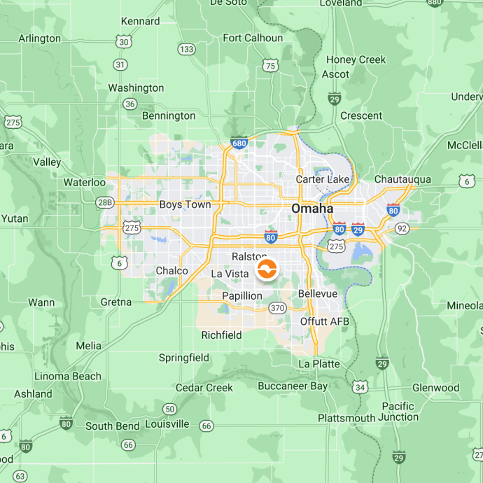 A map showing Omaha, Nebraska with nearby areas like Bellevue, La Vista, and Boys Town. Roads and geographical features are highlighted.