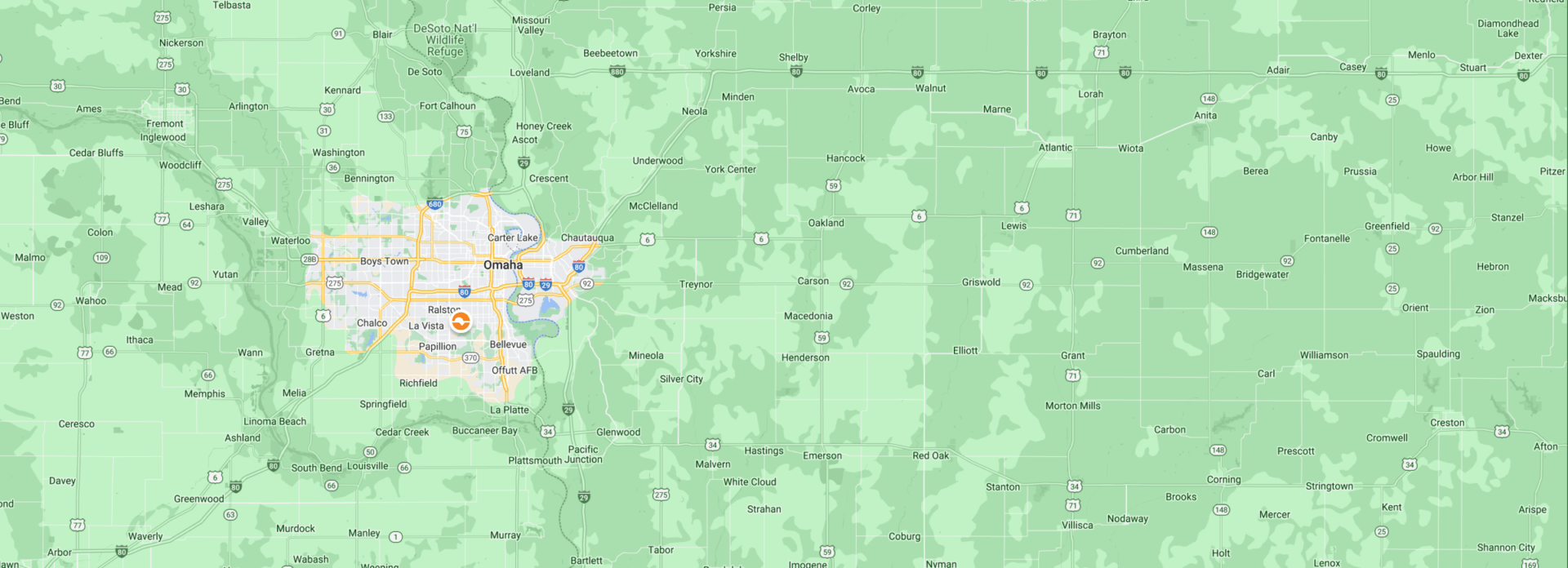 Map highlighting Omaha city and surrounding areas. Places marked include Fremont, Bellevue, and Offutt AFB, featuring highways and natural landscapes.